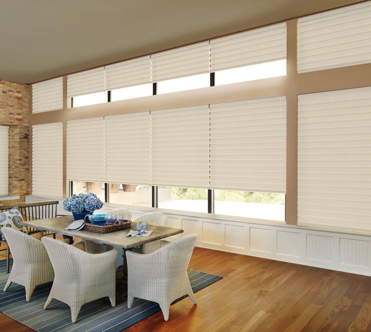 Roman shades above a dining area